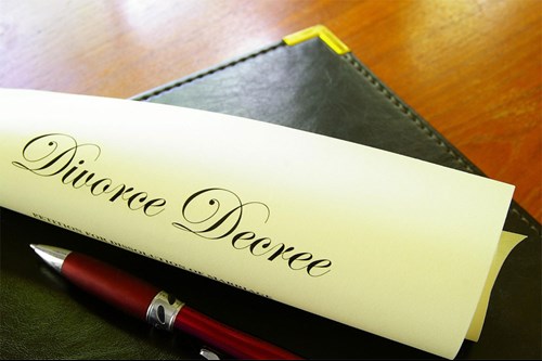 What is the difference between a decree nisi and a decree absolute in divorce law